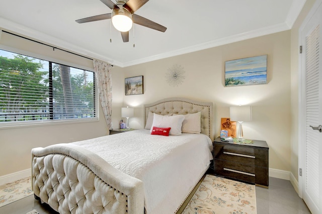 bedroom with ornamental molding and ceiling fan