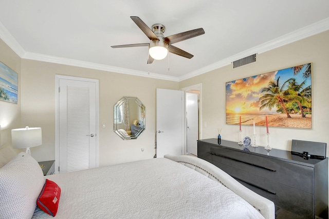 bedroom with crown molding and ceiling fan