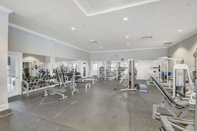 exercise room featuring ornamental molding