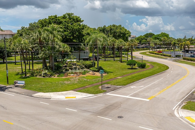 view of community featuring a yard