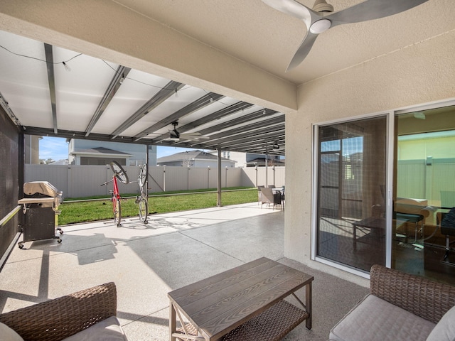 view of patio / terrace featuring ceiling fan