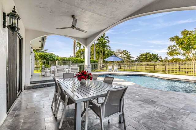 view of patio with a grill, sink, and an outdoor kitchen