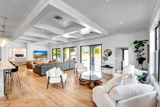 living room with coffered ceiling, ornamental molding, beam ceiling, and light wood-type flooring