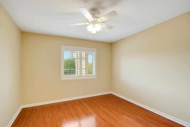 12560 Majesty Cir Unit 401, Boynton Beach, FL 33437 - spare room with wood finished floors and ceiling fan