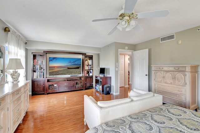 bedroom featuring ceiling fan and light wood-type flooring