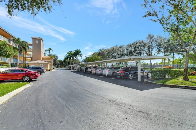 12560 Majesty Cir Unit 401, Boynton Beach, FL 33437 - view of partially covered parking lot