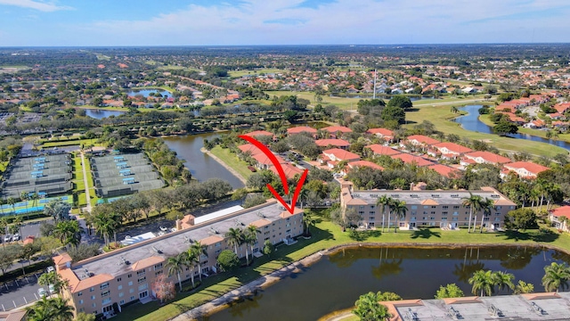 12560 Majesty Cir Unit 401, Boynton Beach, FL 33437 - aerial overview of property's location with a large body of water and apartment complex