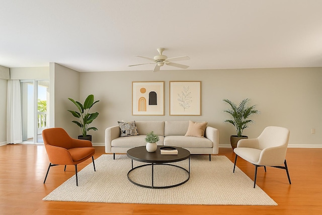 12560 Majesty Cir Unit 401, Boynton Beach, FL 33437 - living room featuring light wood-type flooring and a ceiling fan