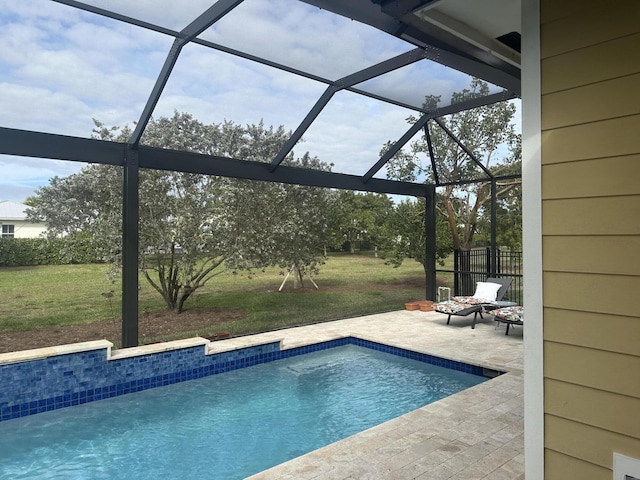 view of pool featuring a yard, a lanai, and a patio