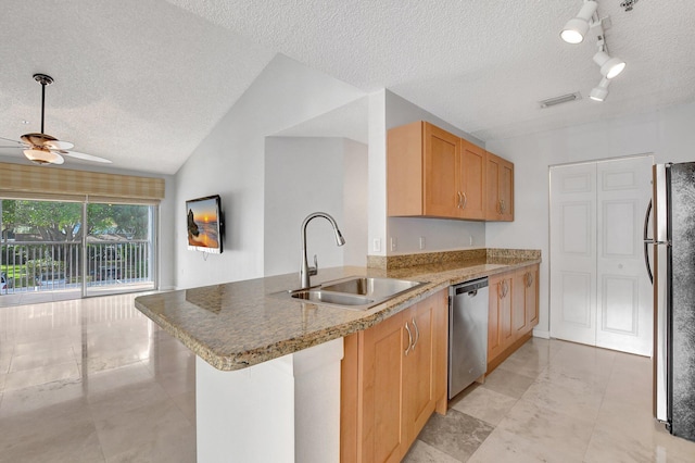 kitchen featuring sink, kitchen peninsula, dishwasher, and refrigerator