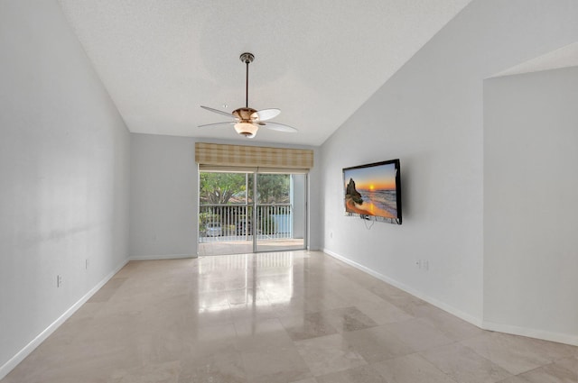 unfurnished room featuring ceiling fan, lofted ceiling, and a textured ceiling