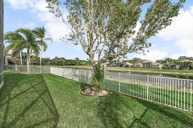 view of yard with a water view