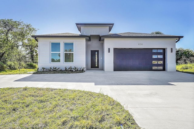 prairie-style house with a garage