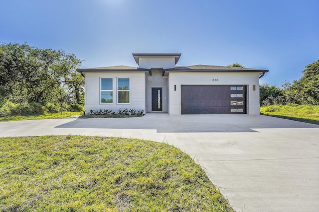 prairie-style home with a garage