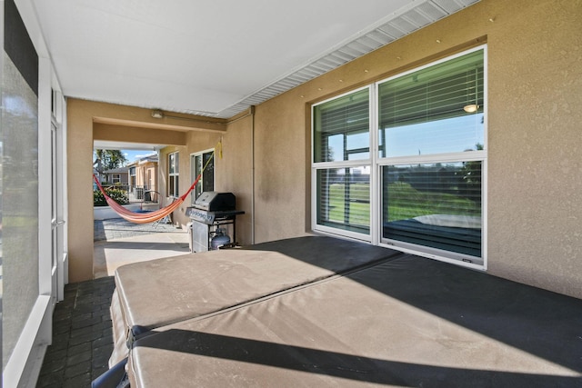 unfurnished sunroom with a wealth of natural light