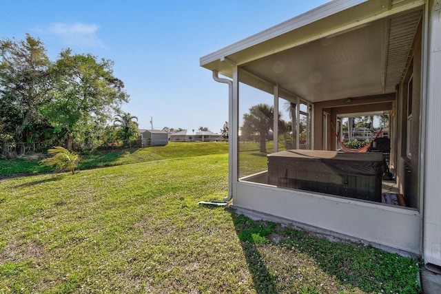 view of yard with a sunroom