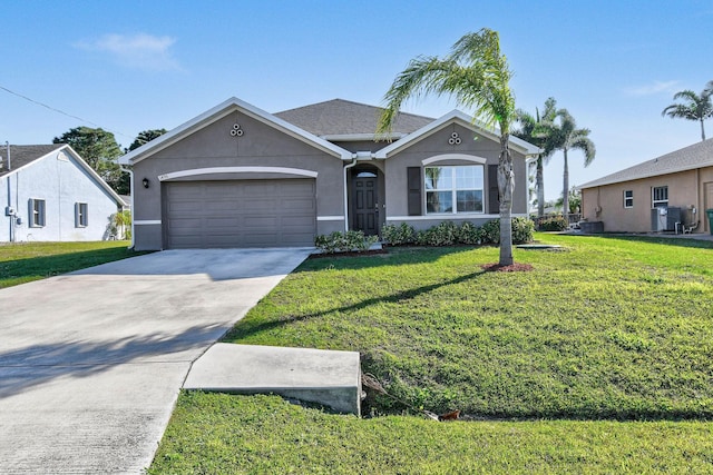 view of front of property featuring a front yard, concrete driveway, an attached garage, and stucco siding