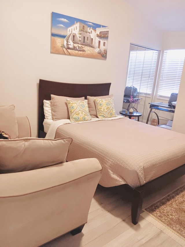 bedroom with light hardwood / wood-style flooring