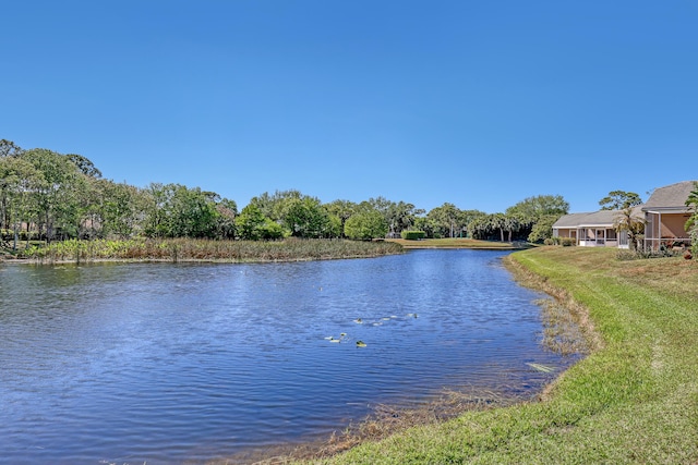 bird's eye view featuring a residential view and a water view