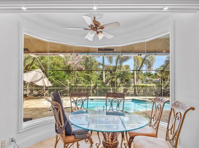 sunroom / solarium with ceiling fan