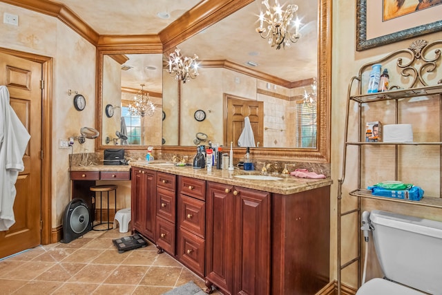 bathroom featuring vanity, a notable chandelier, crown molding, and toilet