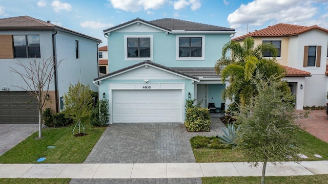 view of front of property featuring a garage