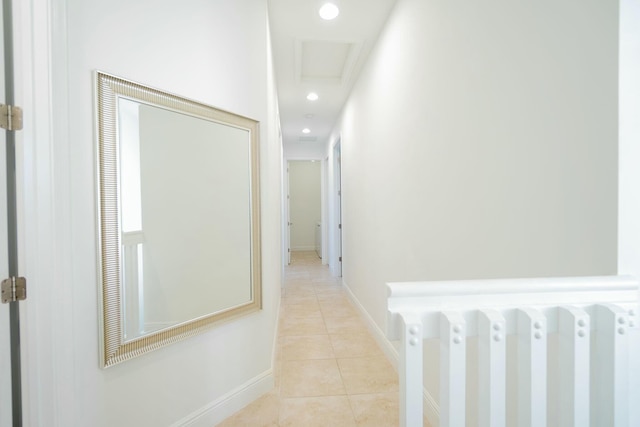 hall with radiator heating unit and light tile patterned floors