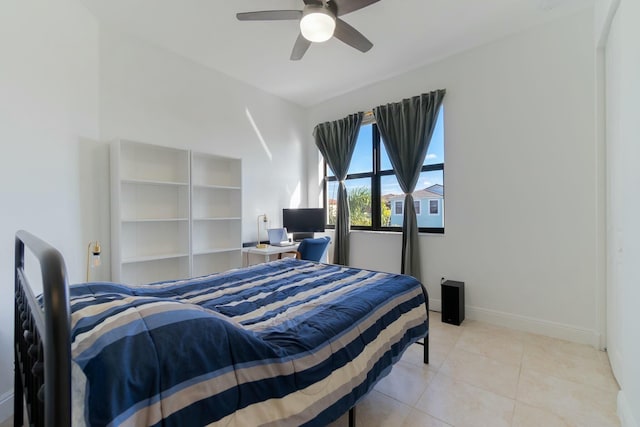 bedroom featuring light tile patterned flooring and ceiling fan