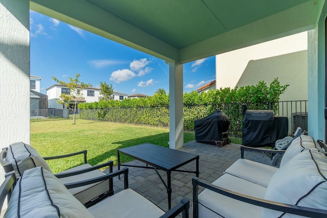 view of patio with grilling area and outdoor lounge area