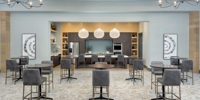 dining room featuring a notable chandelier