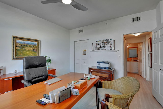 office area featuring ceiling fan and light wood-type flooring