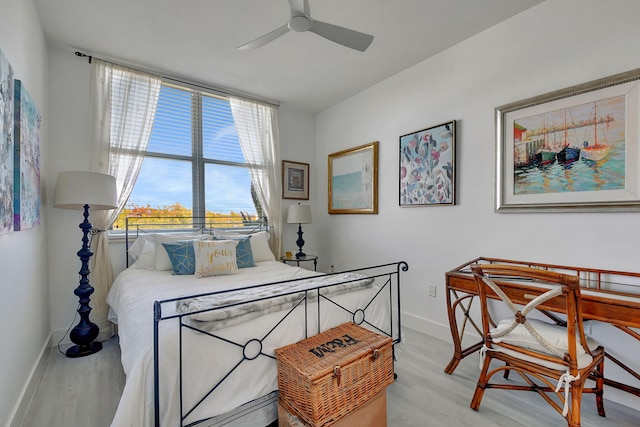 bedroom featuring ceiling fan and light wood-type flooring