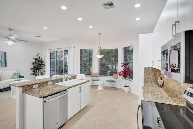 kitchen featuring white cabinetry, sink, hanging light fixtures, ornamental molding, and stainless steel appliances