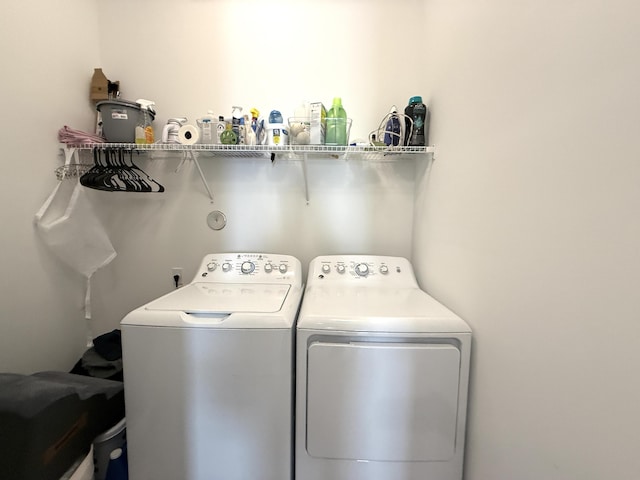 laundry room featuring washer and clothes dryer