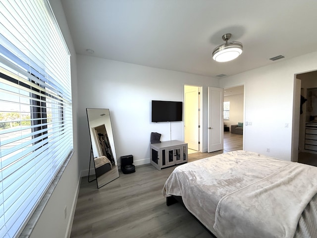 bedroom featuring hardwood / wood-style flooring