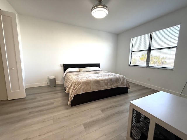 bedroom featuring hardwood / wood-style floors