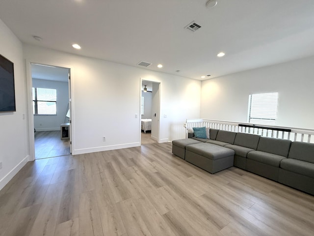 unfurnished living room with light wood-type flooring