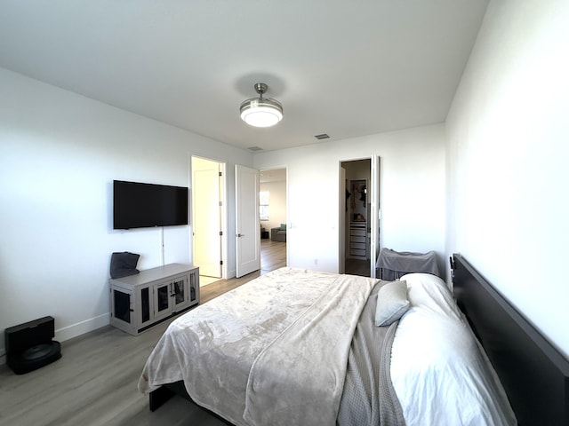 bedroom featuring light wood-type flooring