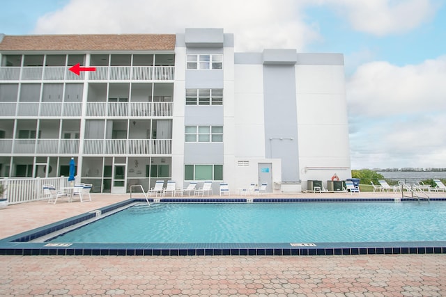 view of pool with a patio area