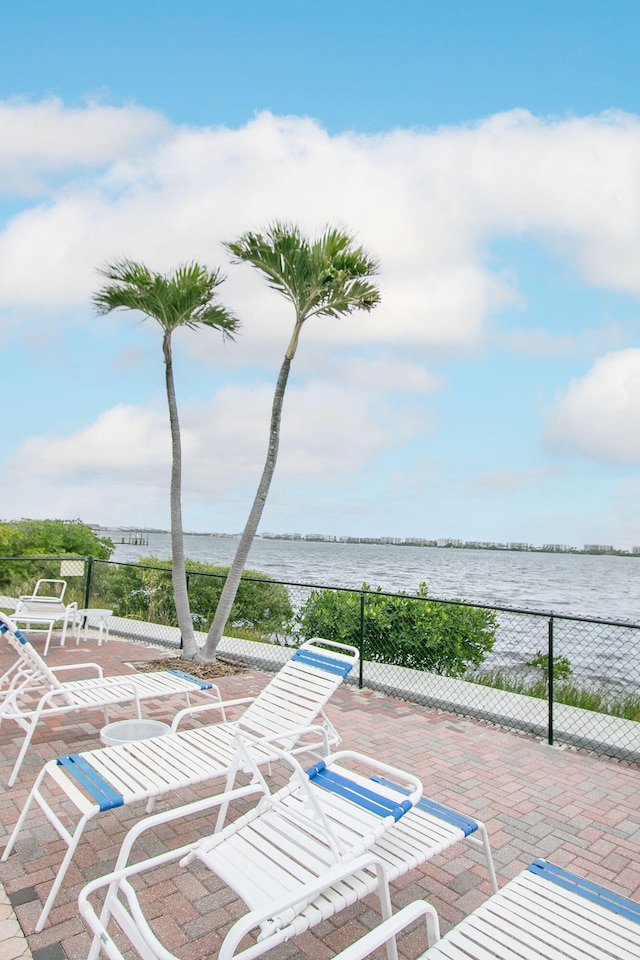 view of patio / terrace featuring a water view