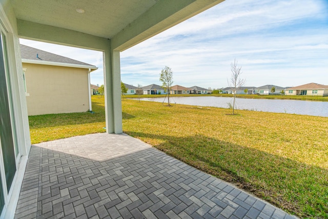 view of patio / terrace featuring a water view