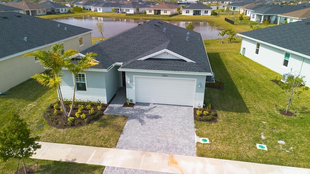 bird's eye view with a water view