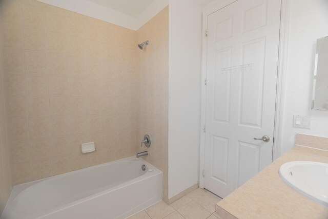 bathroom featuring tile patterned flooring, vanity, and toilet