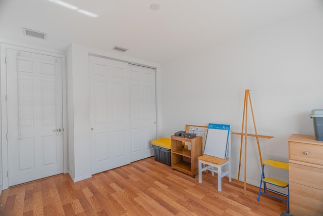 misc room with light hardwood / wood-style floors