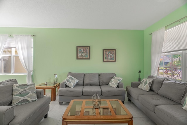 living room with light tile patterned flooring