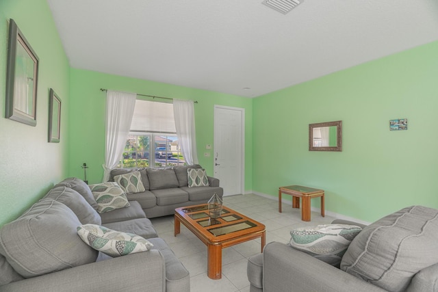 living room featuring light tile patterned flooring