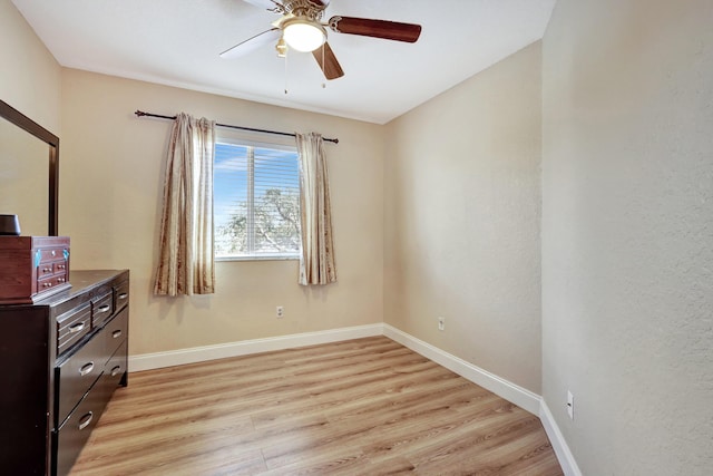 bedroom featuring ceiling fan and light hardwood / wood-style floors