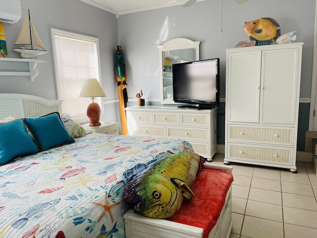 bedroom featuring a wall mounted air conditioner, light tile patterned floors, and ornamental molding