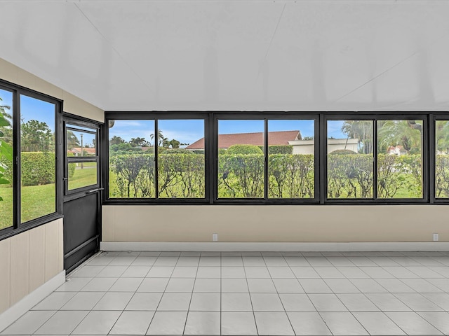 unfurnished sunroom with plenty of natural light