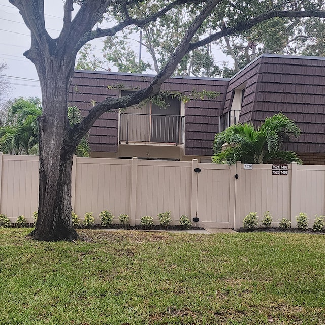 view of home's exterior with a yard